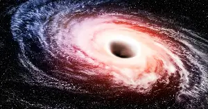 The Milky Way’s central black hole is almost silent today, but a collision with the Large Magellanic Cloud could feed it enough gas to wake it up — roughly two billion years from now