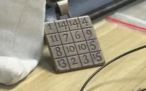 Man baffled by keychain puzzle spotted in class, turns to internet for help