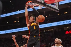 NBA: Hawks extend streak to seven with late spree against Mavs