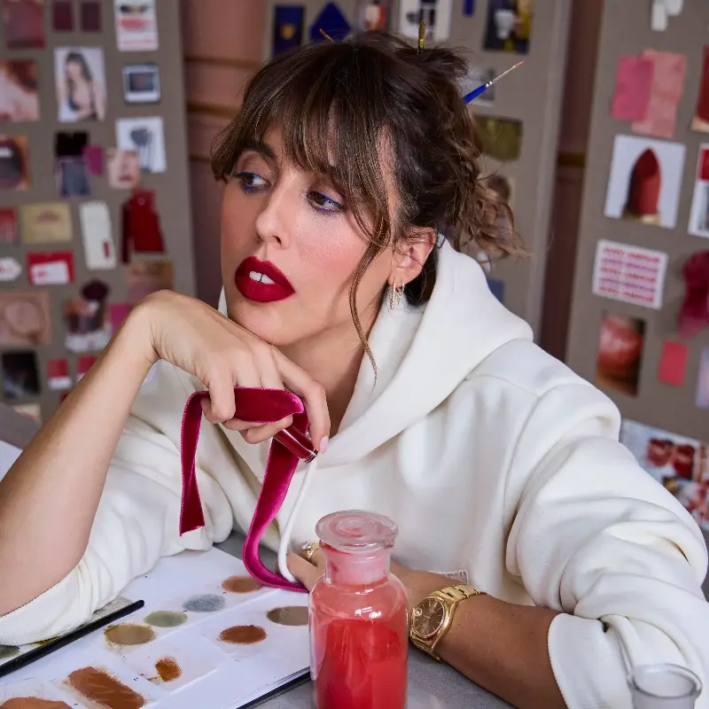 Serrat says that wearing red lips ‘refreshes you’
