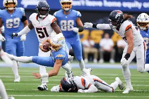 Justin Herbert’s fourth-quarter meltdown dooms winless Chargers in loss to Broncos