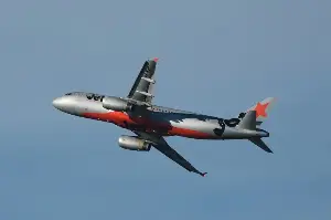 Australian airline to charge fee for carry-on bags in overhead lockers
