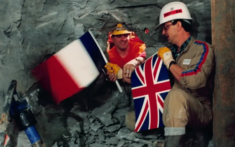 A British and French worker meeting during the breakthrough of the Channel Tunnel in 1990, 40m below the seabed - API/Getty Images