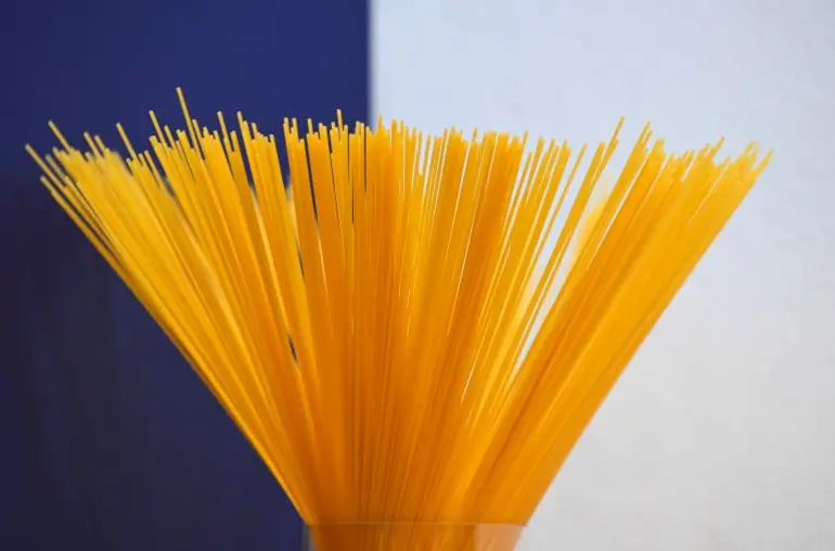 This photograph shows spaghetti pasta during the Barilla Innovation & Technology Experience (BITE) media day at the Barilla headquarters in Parma, on November 18, 2025. Barilla has invested 20 million in a research and development center (Barilla Innovation & Technology Experience - BITE) employing 200 people, which aims to solidify the group's position among the giants of 