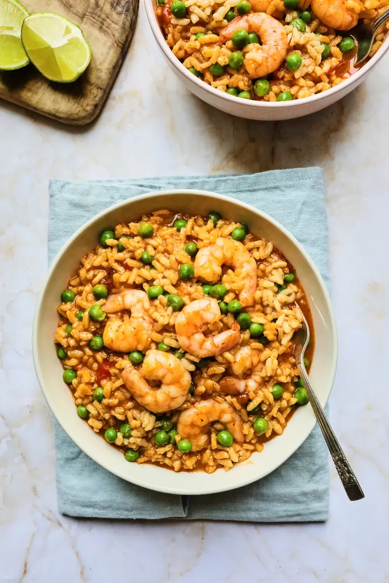 Creamy coconut rice with prawns, peas and a sharp hit of lime (The Rice Association)