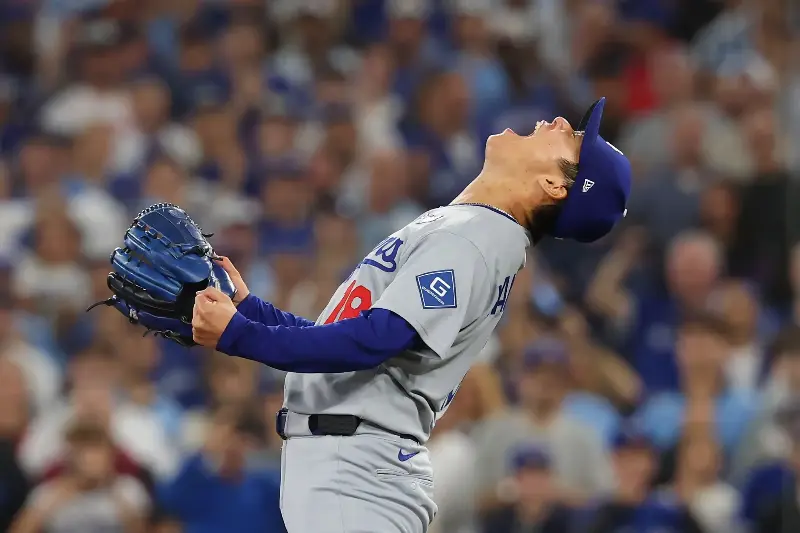 TORONTO, ONTARIO - NOVEMBER 02: Yoshinobu Yamamoto #18 of the Los Angeles Dodgers celebrates after defeating the Toronto Blue Jays 5-4 in game seven of the 2025 World Series at Rogers Center on November 02, 2025 in Toronto, Ontario. (Photo by Gregory Shamus/Getty Images)