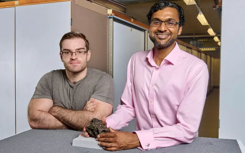 Dr Cassius Morrison (right) and co-author Charlie Scherer, both from UCL, with the fossil - The Trustees of the Natural History Museum