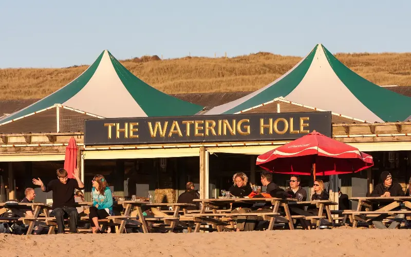 The Watering Hole is the only bar on a beach in the UK - Alamy Stock Photo/Paul Quayle