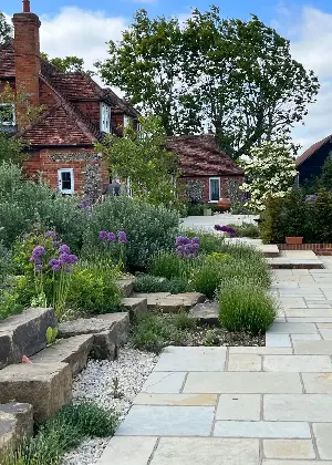 6 Ways to Use Rocks in Your Garden That Make Your Borders Feel More Interesting, Fill Space, and Add Layers to Your Landscaping