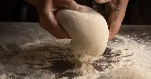 A small spongy artifact found in 2021 in the corner of a Neolithic oven in central Turkey was identified in 2024 as a piece of fermented bread roughly 8,600 years old — placed by someone in the doorway of a mud-brick house at Çatalhöyük around 6600 BCE, in what archaeologists believe is the oldest fermented bread ever discovered, and the oldest direct evidence of the human relationship with yeast