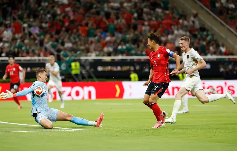 Czech Republic's goalkeeper Matej Kovar saves South Korea's forward Son Heung-min's shot at FIFA World Cup 2026. 