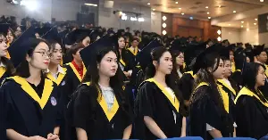 National Economics University awards master's degrees to over 900 students.