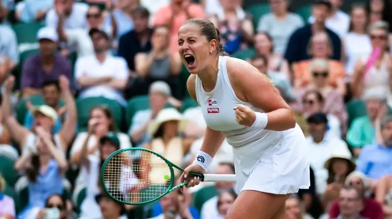 Jelena Ostapenko competes at Wimbledon.