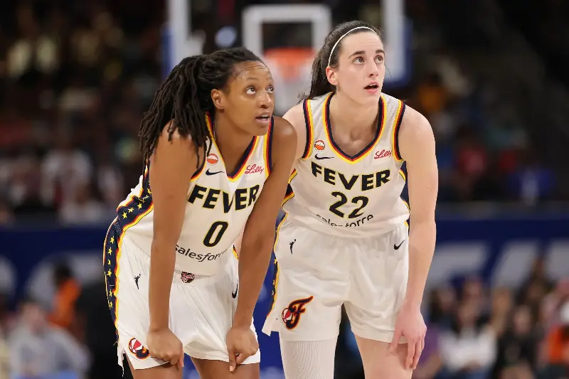 Kelsey Mitchell #0 and Caitlin Clark #22 of the Indiana Fever confer against the Chicago Sky during the first half at Wintrust Arena on August 23, 2026, in Chicago, Illinois. (Photo by Michael Reaves/Getty Images)