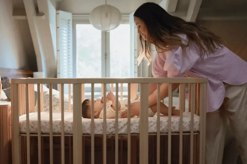 The Stokke nighti crib can convert from a newborn bassinet size to a full size crib and a toddler bed.