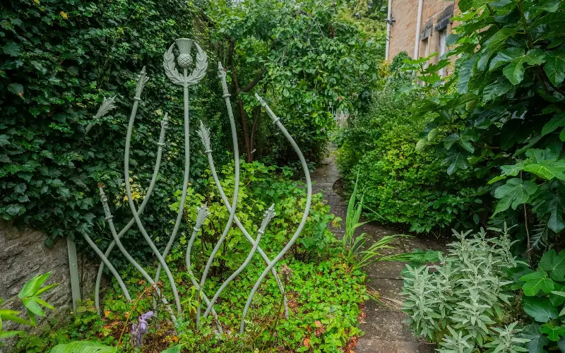 Thistle motifs appear throughout the garden - Chris Watt