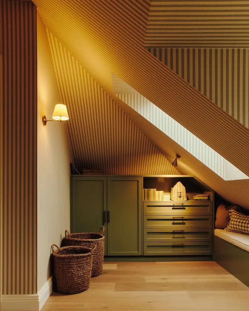 You can never really go wrong with a blend of warm sconces in a cozy room. (Image credit: Studio Hahn. Design: Gangar)