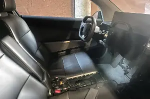 The Tesla Cybercab, an electric vehicle without a steering wheel, has begun testing in the US.