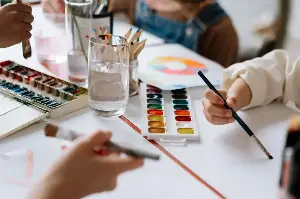 When a seven-year-old reaches for red paint to show anger, the color wheel is not proving a hidden neural pathway, but turning the expanding language of emotion into something the child can see