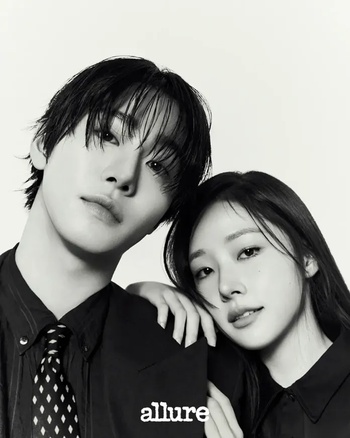 Ahn Hyo Seop with long hair and a woman with long hair, both wearing formal attire, posing closely together with a soft expression.