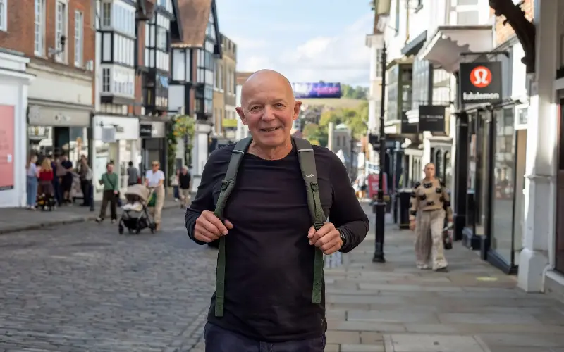 Writer Paul Miles pictured on Guildford High Street, which Dickens praised as the ‘prettiest’ in England - Jeff Gilbert