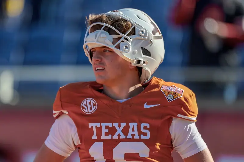 ORLANDO, FLORIDA - DECEMBER 31: Arch Manning #16 of the Texas Longhorns during warm-up before the 2025 Cheez-It Citrus Bowl between the Texas Longhorns and Michigan Wolverines at Camping World Stadium on December 31, 2025 in Orlando, Florida. (Photo by Dustin Markland/Getty Images)