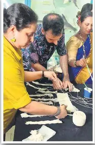 A performance led by Kadambari Koli-Tandel (in yellow) for Goethe-Institut, featuring the collective mummification of Bombay duck, served as a metaphor to store and sustain a form of knowledge system—the traditional drying techniques of the Koli fishing community.