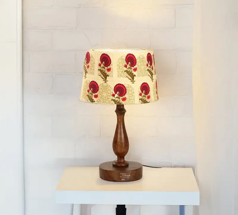 Lamps, candle holders, decorative bowls and small objects can make a room feel more considered.