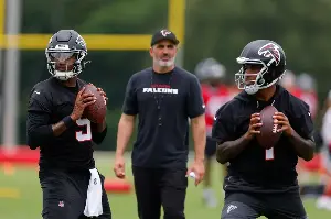 Falcons QB battle takes curious pause