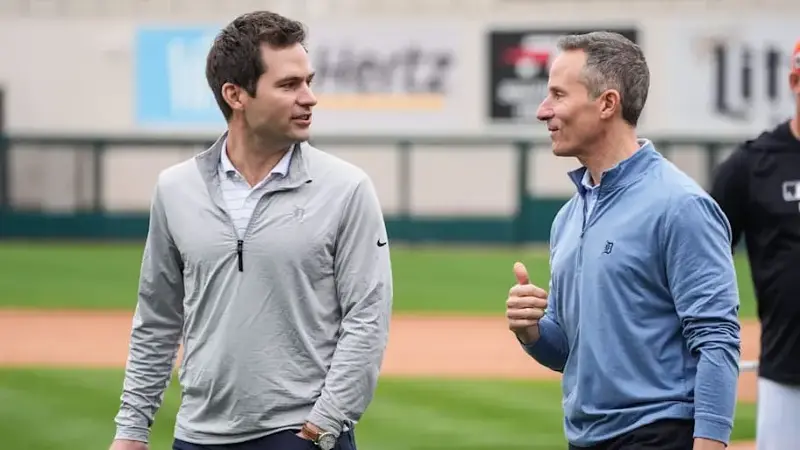 Detroit Tigers president of baseball operation Scott Harris talks to team owner Chris Ilitch