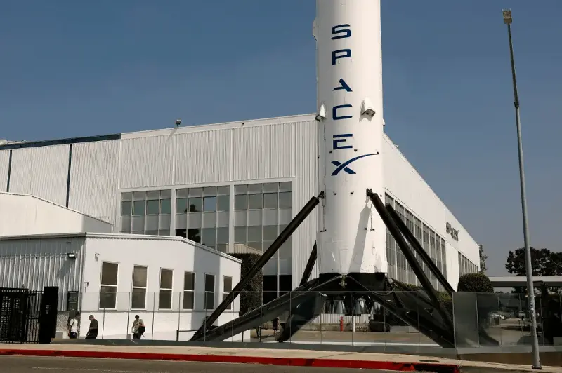 The SpaceX Falcon 9 rocket is displayed at a SpaceX facility on August 4 in Hawthorne, California.