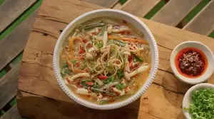 Try this delicious veg burnt-garlic noodle soup by Sanjyot Keer for a comforting dish in the monsoon: See preparation