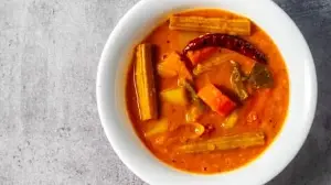 Healthy South Indian Drumstick And Tomato Sambar, A Nourishing Protein-Packed Dish With Vegetables And Spices