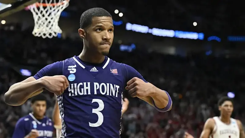 Rob Martin reacts after a basket in the second half against the Arkansas Razorbacks.