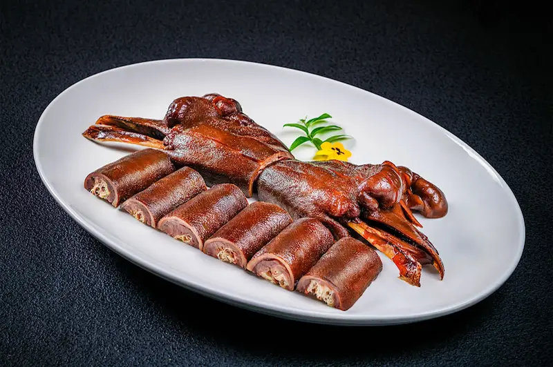 Marinated goose head.