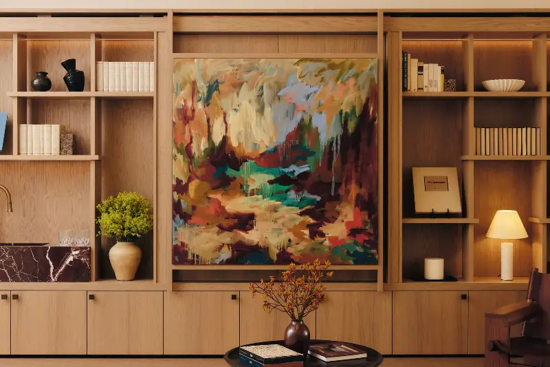The rear sitting room features art by Mary West, commissioned especially for the space. The joinery in which it rests employs a sliding panel mechanism to conceal the television behind. (Image credit: Studio Hahn. Design: Gangar)