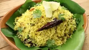 Craving something simple, quick and tasty for lunch? Try Sanjeev Kapoor's flavourful lemon rice with vegetables