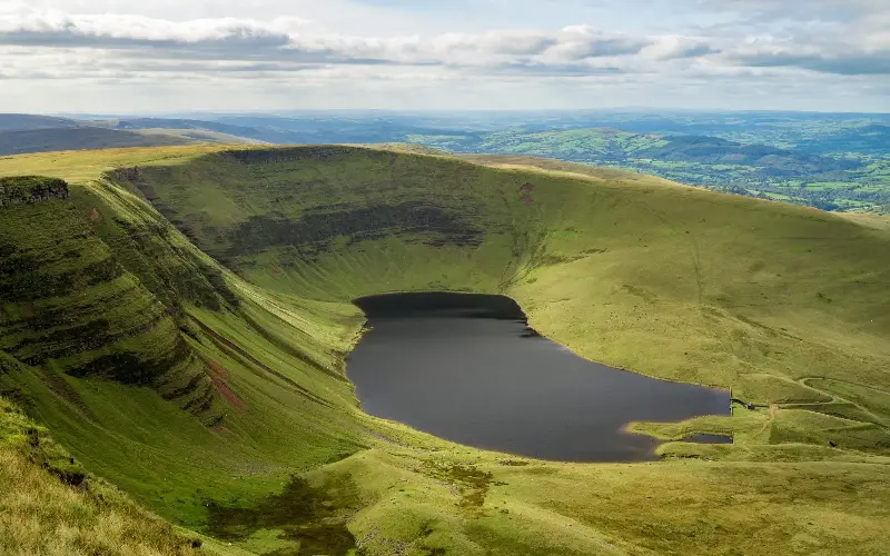 Llyn y Fan Fach and Llyn y Fan Fawr are dark glacial lakes set among the sweeping cirques of the Carmarthen Fans - Krushev Thapa/iStockphoto