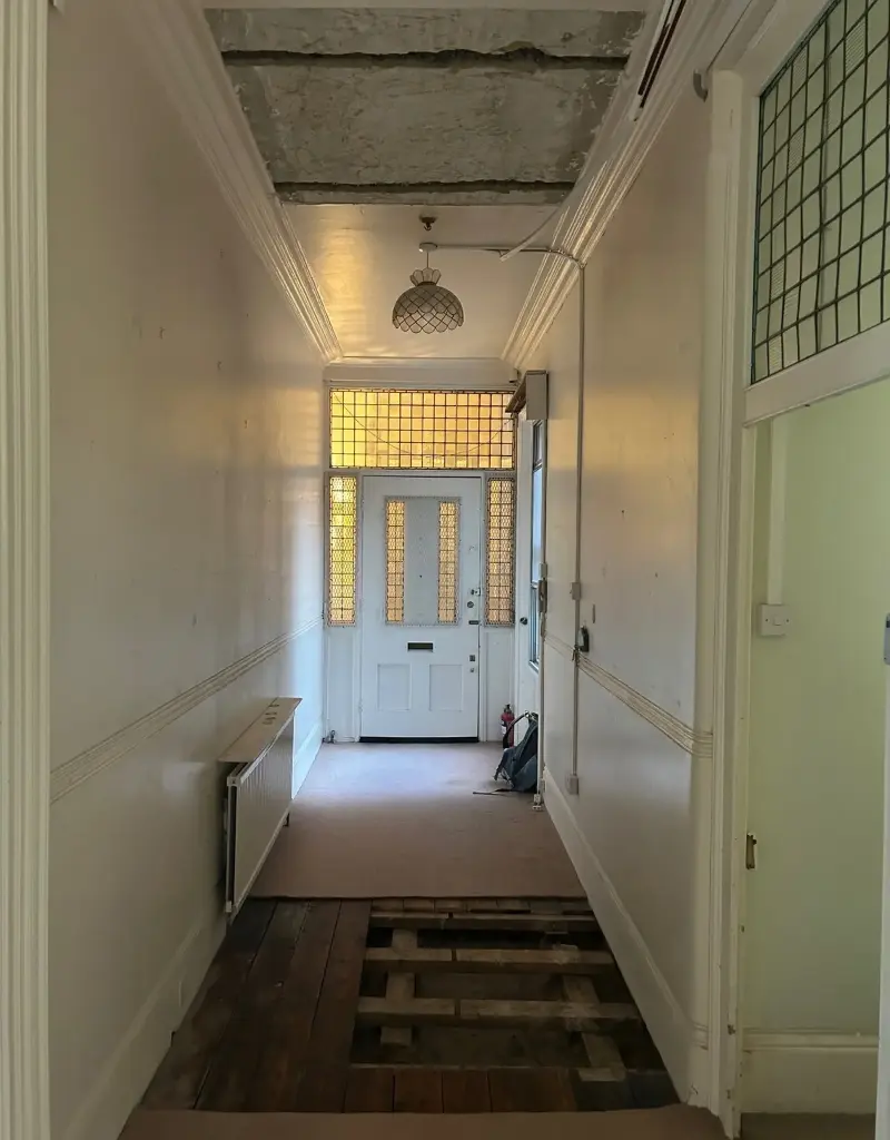 BEFORE: Setting the scene for what's to follow, prior to the renovation, this entryway left much to be desiredDelve Architects