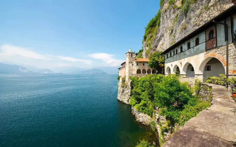 Carved from a rock face, Santa Caterina del Sasso is only visible from the water and is particularly beautiful at sunset - GETTY