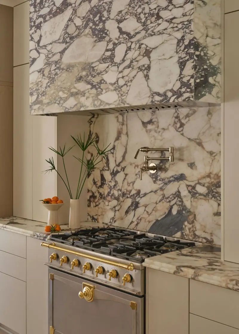 An extractor hood can actually become a focal design feature in your kitchen, and one that's as practical as it is beautiful.  (Image credit: Andrew Welch. Aria Stone Gallery)