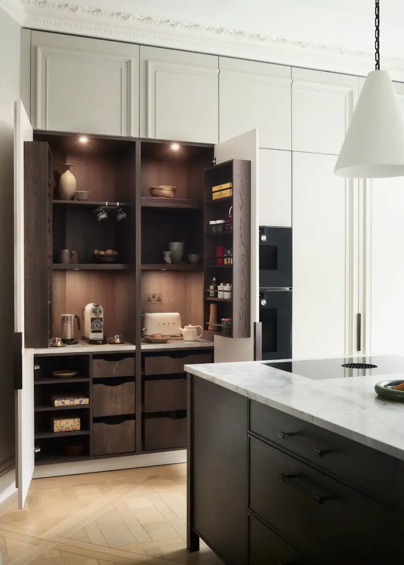 A pocket door breakfast bar makes the perfect hiding spot for your coffee set-up.  (Image credit: Mary Wadsworth. Design: Roundhouse)