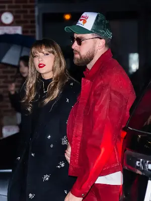 Travis Kelce poses with his dog in Tommy Hilfiger campaign