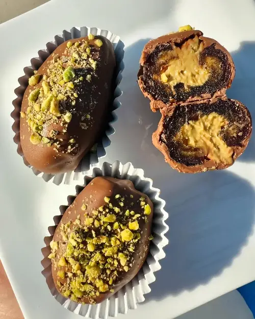 Dates stuffed with katafi pastry and pistachio cream