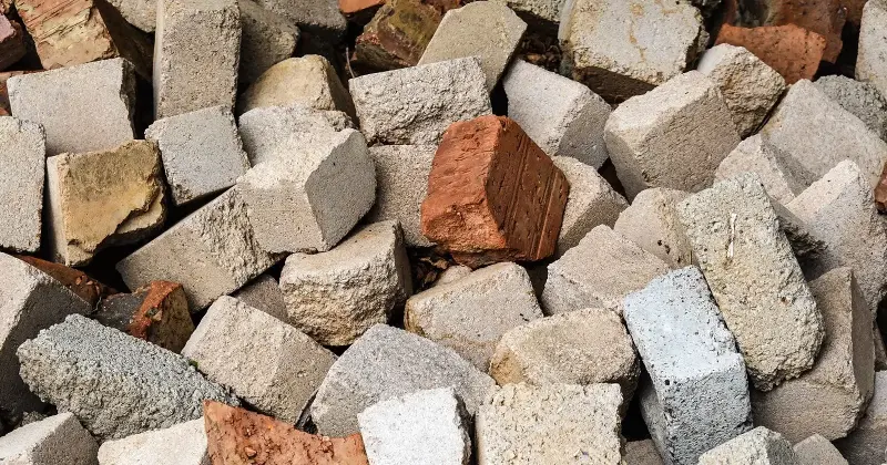 Researchers ground up waste eggshells and used the powder to replace 10 percent of the cement in a batch of concrete. At 28 days, the eggshell mix came out stronger than the plain concrete poured beside it, able to bear more weight before cracking.