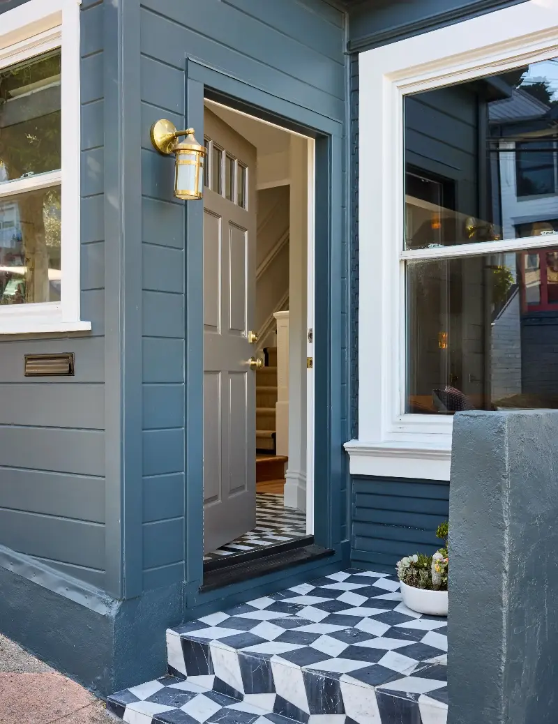 A cheeky modern twist on the traditional monochrome chequered entrance tiles feels rather inviting.John Merkl. Design: Clara Jung. Styling: Kay Jaramillo. Architect: Jack Backus. Builder/Contractor: North Bay Construction