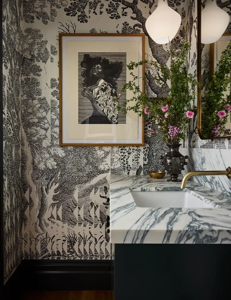 The pretty fresh flowers cut through the monochrome scheme, completely softening it. (Image credit: John Merkl. Design: Clara Jung. Styling: Kay Jaramillo. Architect: Jack Backus. Builder/Contractor: North Bay Construction)