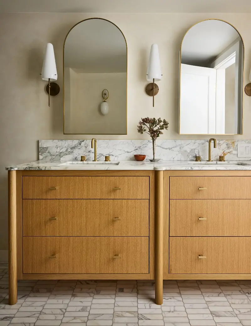 A clean-cut double vanity with elegant wall lights boasts symmetry and good designJohn Merkl. Design: Clara Jung. Styling: Kay Jaramillo. Architect: Jack Backus. Builder/Contractor: North Bay Construction