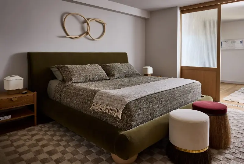 This bedroom may have a slightly paired back palette in comparison to the rest of the house, but these tones are most certainly rich enough to create depth and style. (Image credit: John Merkl. Design: Clara Jung. Styling: Kay Jaramillo. Architect: Jack Backus. Builder/Contractor: North Bay Construction)