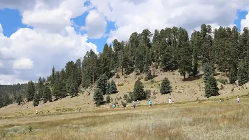 Hikers explore the Cerro La Jara Loop in Valles Caldera National Preserve.